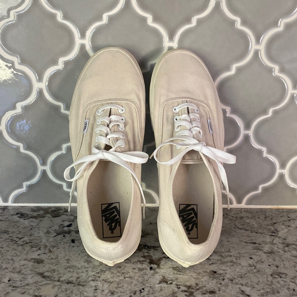 Good condition Vans. Little yellowing from sitting. New w/o tags.